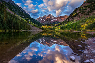 The Maroon Bells Mountains in autumn with a strong lake reflection, near Aspen, CO.