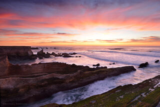 Dark, brooding sea cliffs at Montana de Oro State Park shimmer with evening light on this perfect California perch. 