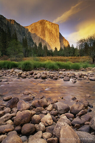 Sunset light glows on El Capitan and the Merced River in Yosemite Valley.