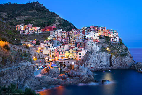 Italian Village of Manarola comes alive at dusk.