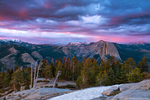 From Sentinel Dome one views the snowy Sierra Nevada crest, including El  Half Dome, all in Yosemite National Park.