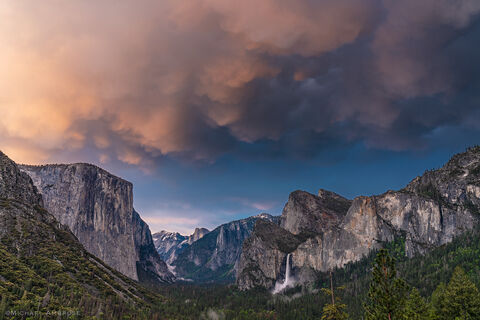 Tunnel View in Yosemite with views of El Capitan, Half Dome, and Bridalveil Fall at sunset.