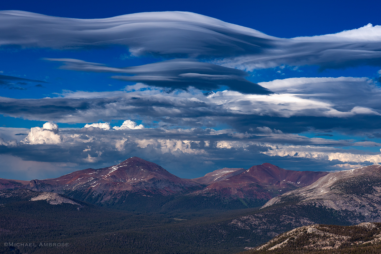 Lenticular clouds hover over the Dana Crest, in Yosemite National Park, as viewed from Upper Cathedral Peak.