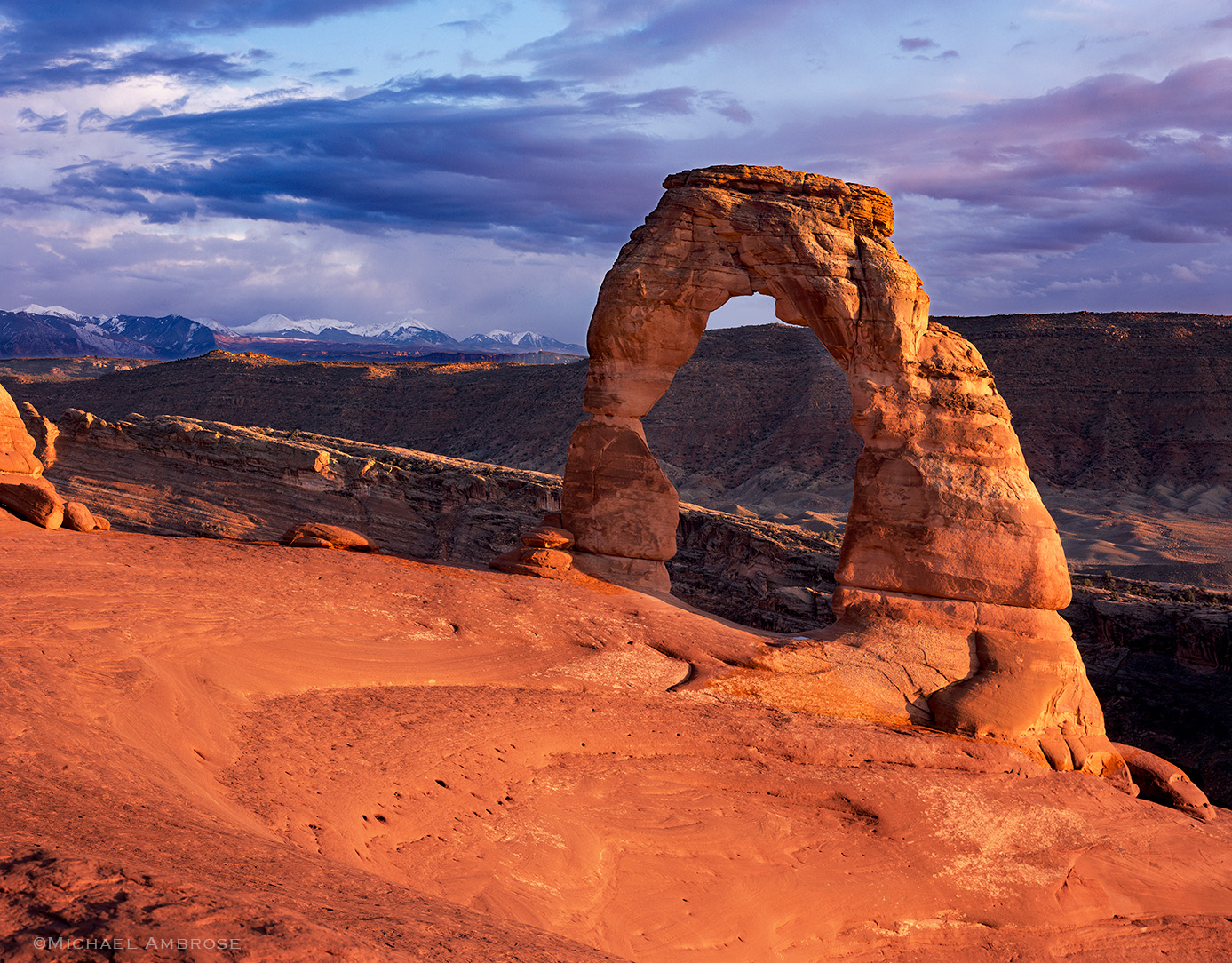 Deliate Arch illuminated after a brief storm in Arches National Park, Utah. 
