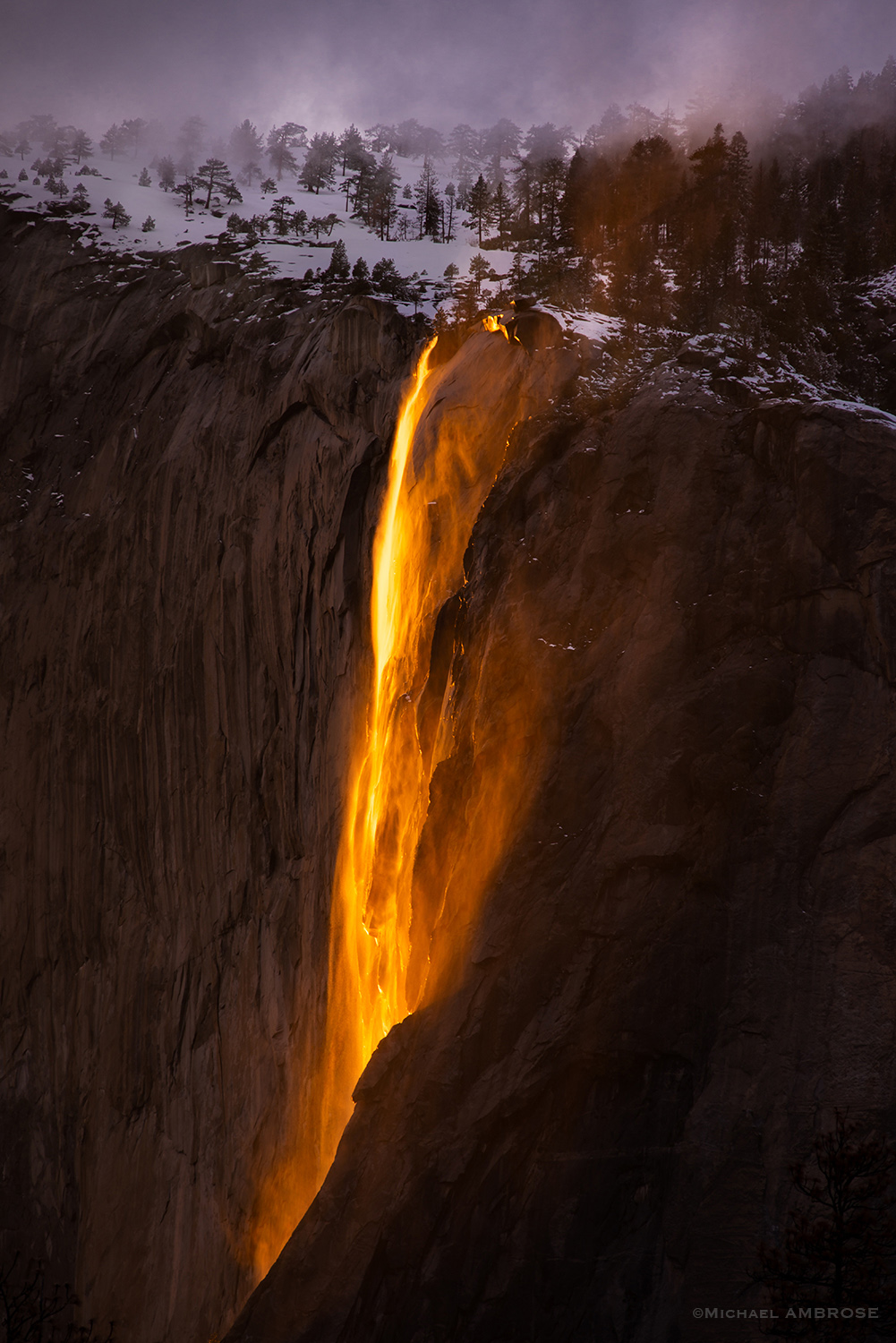 A photograph of the famous Horsetail Fall in Yosemite National Park, a waterfall flowing off El Capitan seasonally.