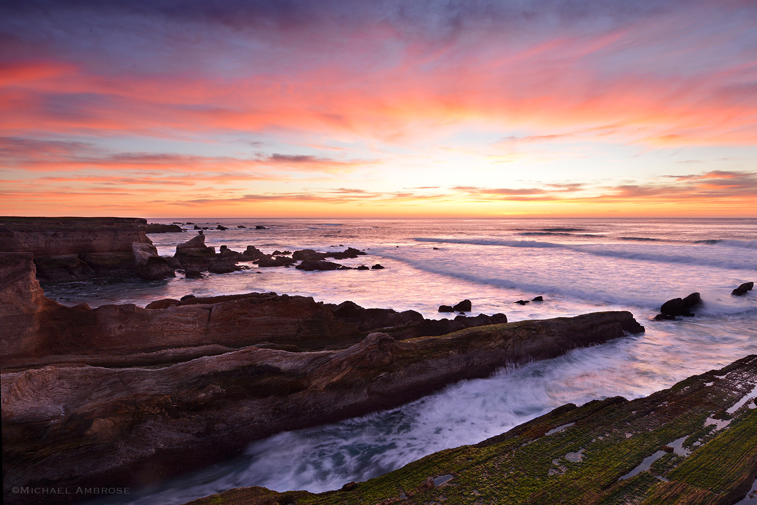 Dark, brooding sea cliffs at Montana de Oro State Park shimmer with evening light on this perfect California perch. 